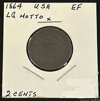 Front side of 1864 US Shield 2 Cents coin showing the shield, date, and large motto with EF condition noted.
