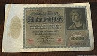 Full view of the 1922 German 10,000 Mark banknote showing front side with denomination, date, serial number, and likeness of man.