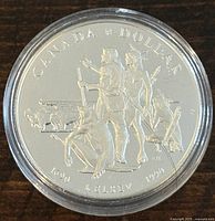 Obverse side of the coin showing historical figure design with 'CANADA DOLLAR', '1620 KELSEY 1950' inscriptions