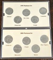 Photo of front showing 1999 set with Delaware, New Jersey, Connecticut, Pennsylvania, and Georgia quarters in protective casing.