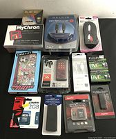 Top-down photo showing all 12 items arranged on a table with original packaging visible.