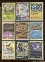 Front view of 9 assorted Pokémon trading cards, each featuring a different Pokémon with stats and moves.