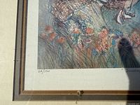 Close-up of numbering 28/500 indicating limited edition on lithograph "Sunday at the Park"