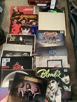 Overview of assorted vinyl records arranged on floor