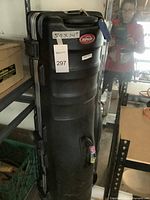 Front view of the black SKB golf club hard carrying case, showing the brand logo, measurement label (50 x 14"), and handle.