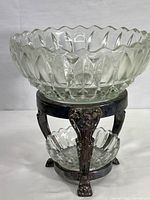 Full view shows the 2-tier silverplated stand holding the two clear glass bowls, sized large on top and small on bottom.