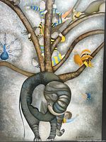 Close-up of the framed poster art showing detailed subjects and artwork style