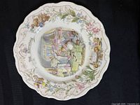 Full view of the collector plate showing the central birthday scene and floral border