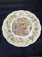 Full view of the Royal Doulton Brambly Hedge collector plate titled 'The Store Stump' featuring mice in an interior store setting, surrounded by floral ivy border.