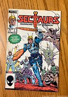 Front cover of the Sectaurs Warriors of Symbion #1 comic book showing main characters and Marvel branding.