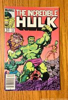 Front cover of The Incredible Hulk #314 comic book showing Hulk and characters on bright pink background with Marvel branding and price details.