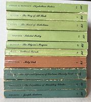 Stack of ten Rinehard Editions paperback books by various classic authors, worn condition.