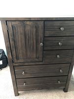 Front view of entire chest showing drawer and door configuration