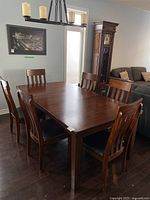 Dining table and six chairs, full set view