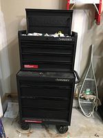 Full view of stacked Husky tool chest showing upper chest and lower cabinet on wheels