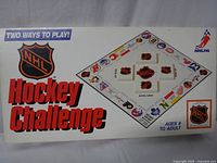 Front of NHL Hockey Challenge boardgame box showing the game title and NHLPA logo with a diamond-shaped board illustration.