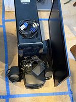 Dell desktop computer tower with accompanying cables and Samsung monitor.