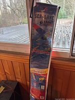 Photo of the kite packaging showing the 3D Seaplane Airshow Kite design and dimensions.