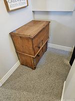 Photo of the dry sink showing the solid pine construction and overall cabinet shape with decorative spindle sides.