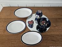 Overview of all six pieces displayed on a mirror disc