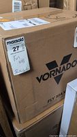 Photo of sealed box showing the Vornado brand and Fly Max on the packaging, with MaxSold lot sticker.