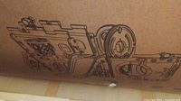 Detailed printed cartoon graphics of pirate ship design on the packaging box