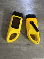 Two yellow solar/crank flashlights showing solar panel and crank handle