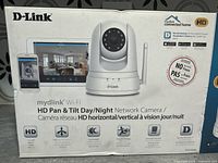 Front box showing the D-Link HD Pan & Tilt Day/Night Network Camera and smartphone compatibility.