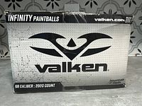 Box showing Valken Infinity branding and details including 68 caliber and 2000 count.