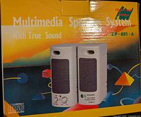 Box showing multimedia computer speakers with true sound and volume/bass control.