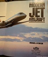 Cover of Modern Jet Aircraft by Michael J.H. Taylor showing a jet flying with clouds and sky background