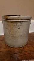 Front side of the beige stoneware crock showing 'Brantford Stoneware' marking and number 3