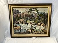 Frontal view of framed landscape painting showing entire scene