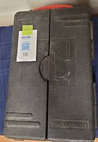 Closed view of black hard plastic case with handle. Text reads '71 PC AIR TOOL SET' and 'KING GAGE BRAND'. Case has raised outline image of air tools.