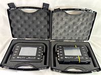 Two 3ality 3FLEX SPC-7000 stereo platform controllers in open black hard carrying cases with foam inserts.
