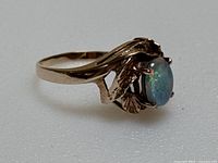 Side angle showing ring profile, band curvature and stone setting