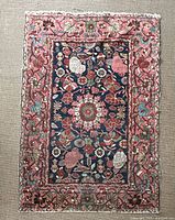 Overhead view of entire rug showing full pattern and overall condition