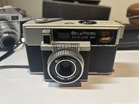 Front view of Bell & Howell Autoload 341 camera showing lens, rangefinder and shutter button