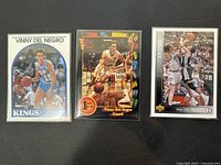 Three different Vinny Del Negro basketball trading cards laid side by side showing front faces, including NBA Hoops, Collector's Choice and Select versions from the 1990s.