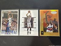 Three Anfernee Hardaway basketball cards arranged side by side showing front and back of card series.