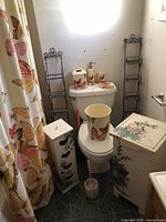 Full view of the bathroom showing all ensemble items coordinated with butterfly theme.