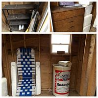 Photo showing a floating lounge chair with blue and white woven strap design, vintage Budweiser cylindrical cooler on wheels with worn label, wooden bureau, styrofoam coolers, and a dark metal 3-shelf stand inside a wooden shed.