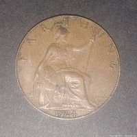Front side of the coin showing the seated Britannia with shield and trident, dated 1924.