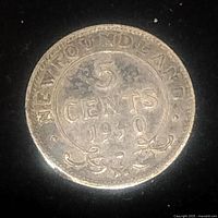 Close-up image of the 1940 Newfoundland silver 5 cent coin showing the denomination and year.