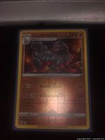 Front of the Hisuian Arcanine Reverse Holo Pokemon card showing the image of the Pokemon and attack details.