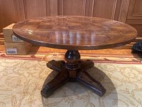 Round tabletop front view showing parquet pattern and edge