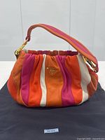 Bag front three-quarter view on white background