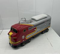 Front three-quarter view showing front grill, headlight, and Santa Fe badge