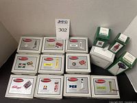 Overview of 11 PHB Retrospect grey boxes and 3 Midwest green boxes