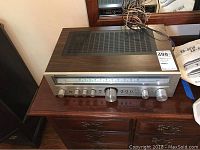 Front view of Kenwood KR-5010 stereo receiver showing front panel controls and analog tuning dial.